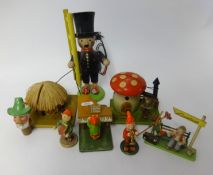 A collection of German novelty gnome figures also a Corgi 'Chitty Chitty Bang Bang' Diecast model