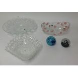 Three 20th Century moulded glass tableware's, a Caithness 'High Seas' paperweight and another.