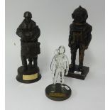 Three Buckingham pewter figures, a Peter Hicks cold cast metal military diving figure, a Robert