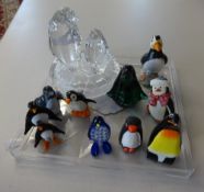 Ten novetly glass and other penguins.