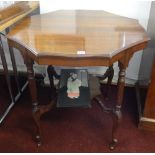 An Edwardian mahogany occasional two tier table.