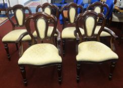 A set of six reproduction Victorian dining chairs.