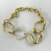 Swarovski, a gilt and crystal set bracelet, boxed.