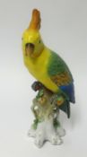 A porcelain model of a parrot with gold anchor mark, height 30cm.