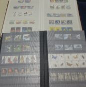 Three stamp albums including mainly 20th Century commemorative Mint stamps (3).