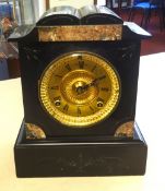 Ansonia, black marble mantel clock with eight day striking movement and key.