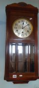 An early 20th century mahogany cased wall clock.