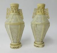 Two antique carved ivory vases.