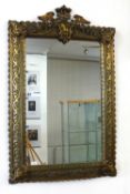 A ornate pierced brass framed mirror, overall size 70cm x 48cm.