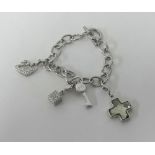 Swarovski, a white metal charm bracelet.