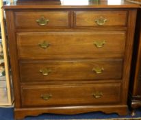 A hardwood chest of five drawers, early 20th Century, width 101cm.