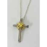 Tiffany silver and gold cross and fine chain, boxed.