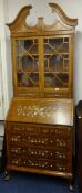 A modern continental walnut and marquetry inlaid bureau bookcase, width 80cm.