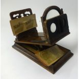 Victorian walnut stereoscope viewer with four cards.