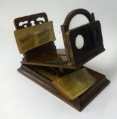 Victorian walnut stereoscope viewer with four cards.