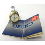 A gents Seiko gilt and stainless steel automatic wristwatch.