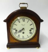 Comitti, London, a mahogany cased chiming bracket clock with key, height 29cm.