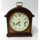 Comitti, London, a mahogany cased chiming bracket clock with key, height 29cm.