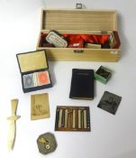 A modern pocket sundial and compass together with a box of various booklets, vintage items, studs