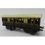 German Bing gauge 0 1920's GWR carriage with opening doors 8-wheel 'Bogie' passenger coach, circa