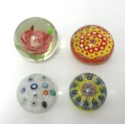 Four paper weights including Millefiori.