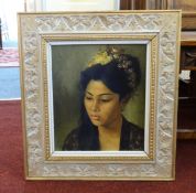 A 20th Century oil on canvas, portrait, Balinese Woman, indistinctly signed, 34cm x 30cm.
