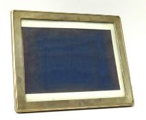 A rectangular silver photo frame with easel hardwood back 25cm x 30cm.