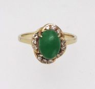A 14ct jade and diamond cluster ring, finger size K.