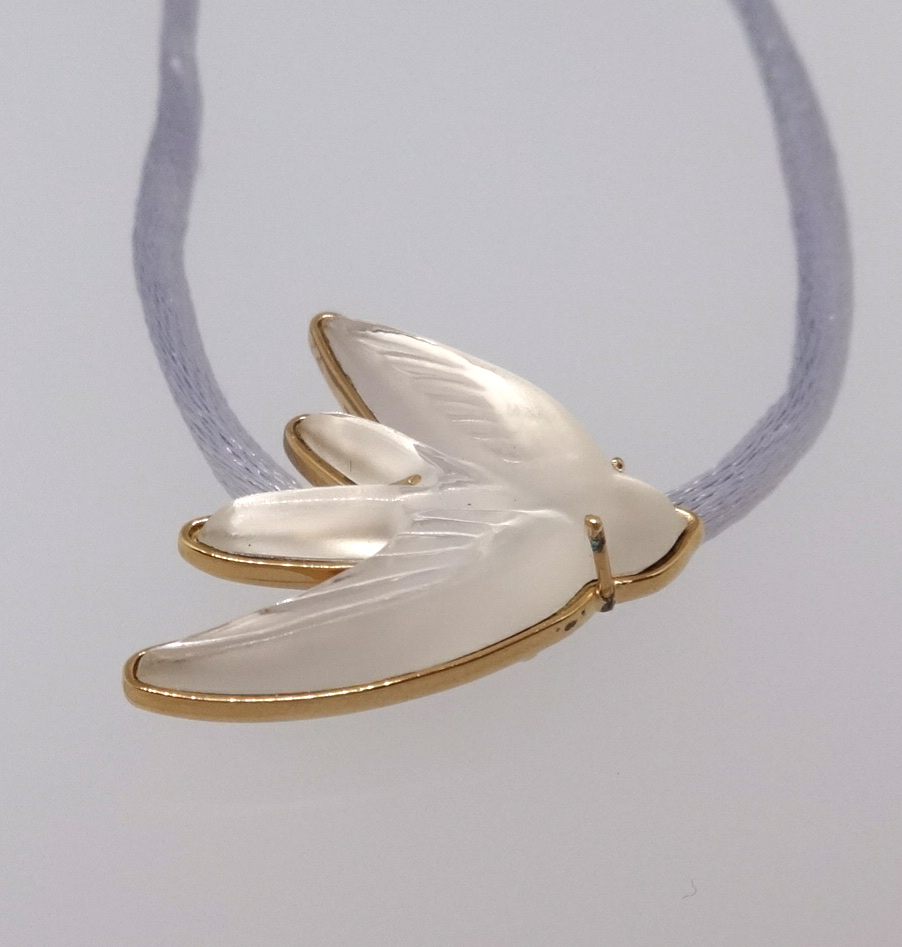 Lalique, a glass pendant, dove, cased.