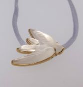 Lalique, a glass pendant, dove, cased.