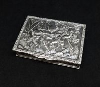 A continental silver heavy gauged snuff box with gilt interior, heavily embossed patterned depicting