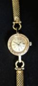 Omega, a ladies 14ct gold wristwatch, approx 15.6gms.