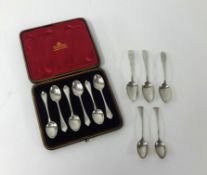 A set of six George V silver rat tail coffee spoons, cased together with three Georgian bright cut