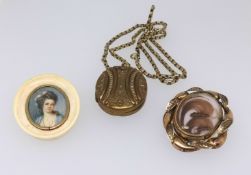 A Victorian mourning brooch, a gilt metal locket and chain and a miniature portrait of a Lady in a