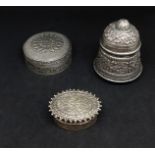 Three continental silver lidded pots with ornate chased design.