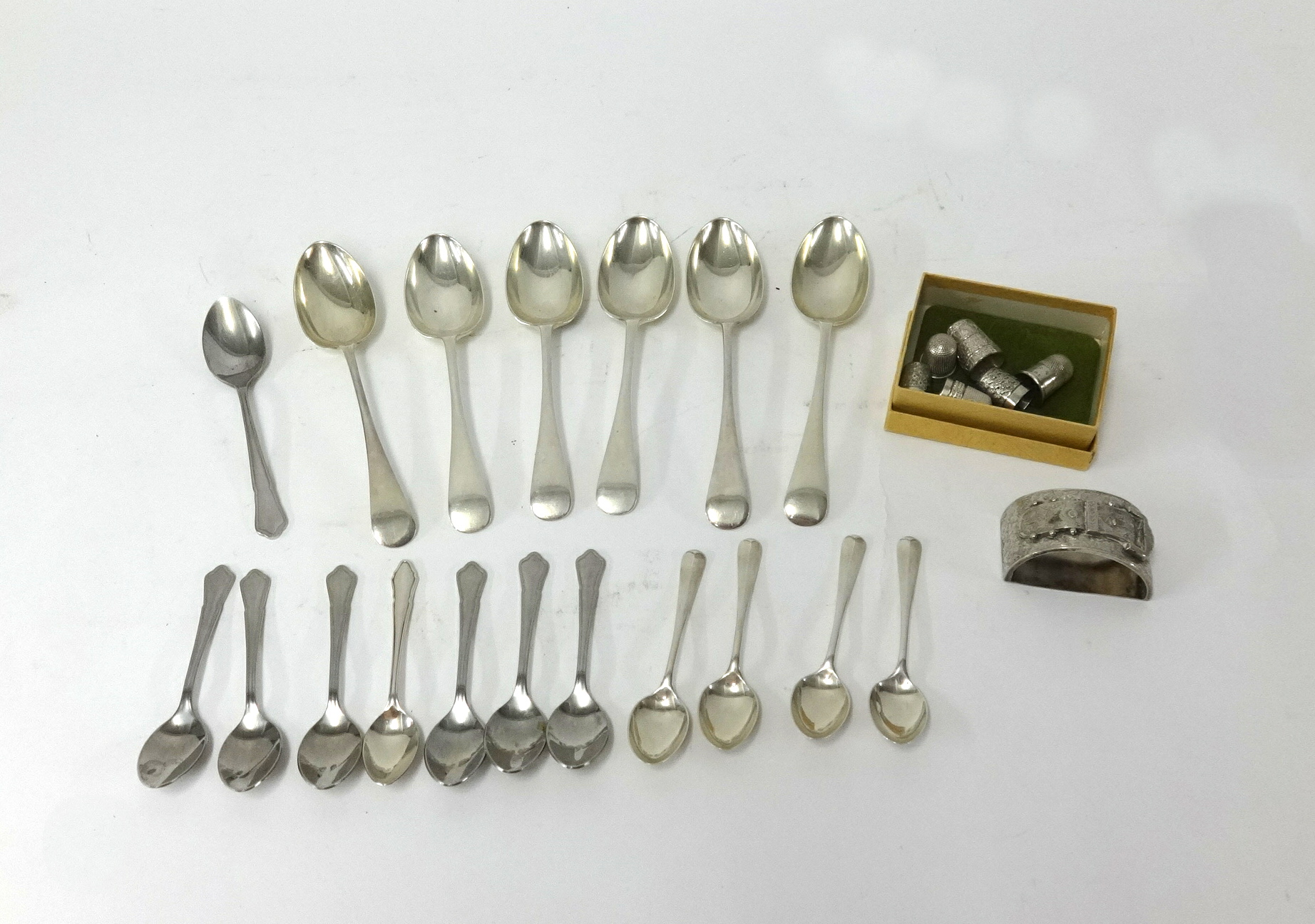 Various silver table and tea spoons also thimbles, buckle silver napkin ring etc..