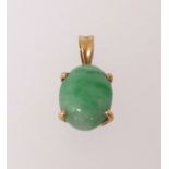 A single stone oval cabochon cut jadeite pendant, mounted in all yellow gold, four claw setting with