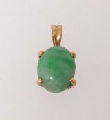 A single stone oval cabochon cut jadeite pendant, mounted in all yellow gold, four claw setting with