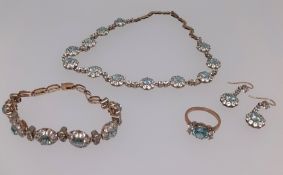 Blue Zircon, a suite of matching jewellery, comprising bracelet, ring, necklace and earrings set