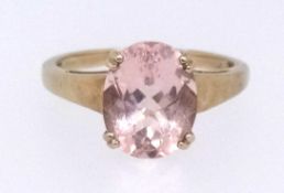 A modern morganite dress ring set in yellow gold, stamped 9k, finger size O.