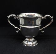 A George V silver twin handled cup, height 9cm, approx 3.3oz.