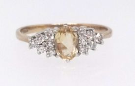 A 9ct diamond and yellow stone fancy ring, finger size N.