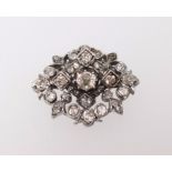 Antique diamond brooch with removable centre section.