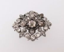 Antique diamond brooch with removable centre section.