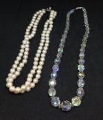 A double row cultured pearl necklace with silver clasp, the box marked Sakata, together with some