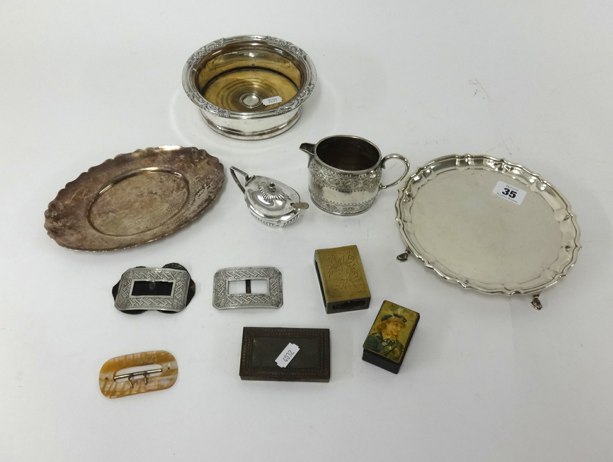 Collection of silver plated wares including salver, coaster, mustard pot also pair of silver buckles