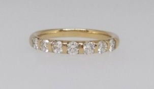 Seven stone diamond half eternity ring, comprising round brilliant cut diamonds, total diamond