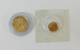 Royal Mint, 2010 sovereign, boxed and a 2008 quarter sovereign.