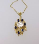 An 18ct pendant set with six synthetic blue stones approx 9.7gms together with a copy of a recent