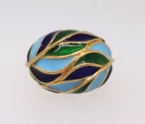A modern 18ct and enamelled dress ring, approx 12.70gms, ring size M.